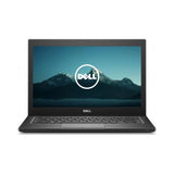 Dell laptop with a mountainous background on the screen