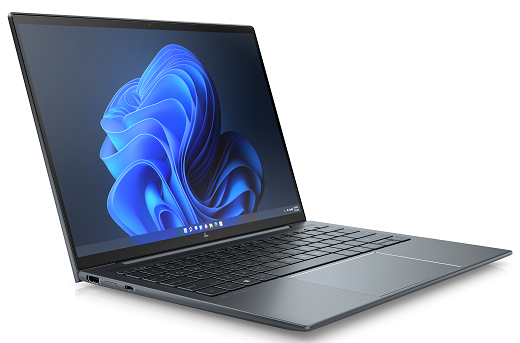 Laptop with a blue abstract design on the screen against a white background