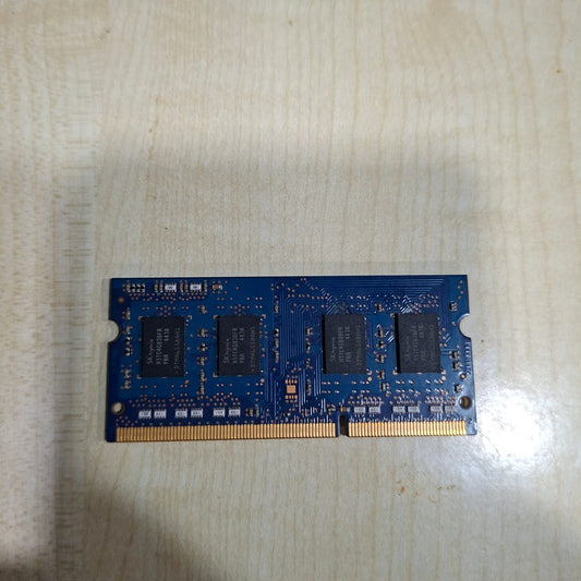 Computer memory module on a light wooden surface