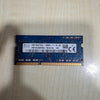 Computer memory module on a light wooden surface