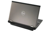A silver and black Dell laptop shown open at an angle against a plain white background.