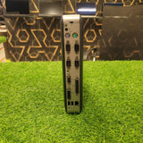 HP T628 Thin Client Computer standing on a grass-like surface,