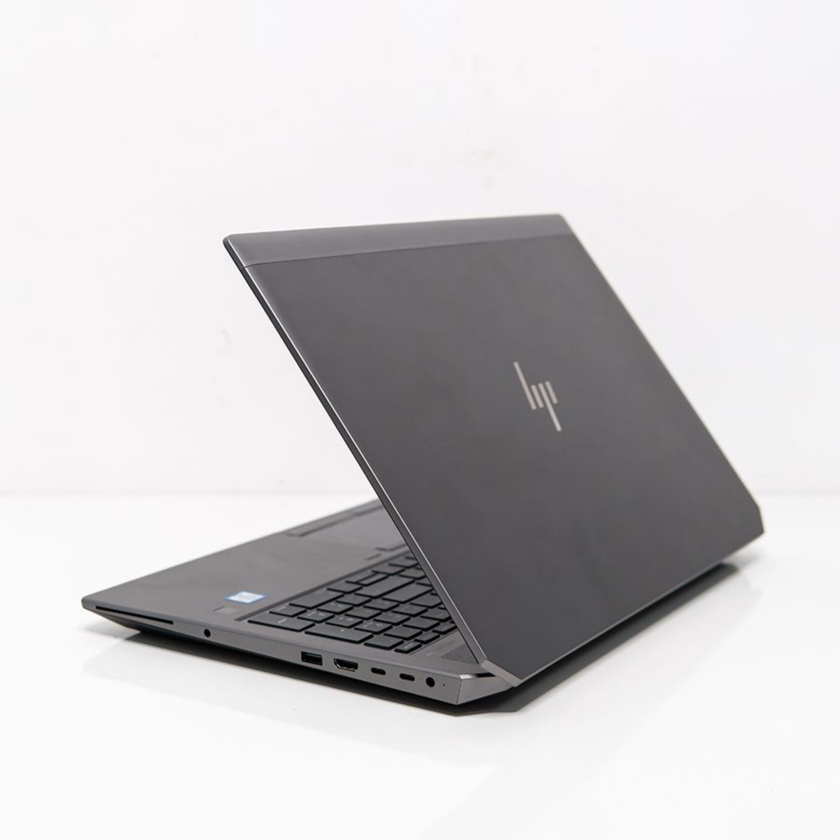 Gray HP laptop on a white background