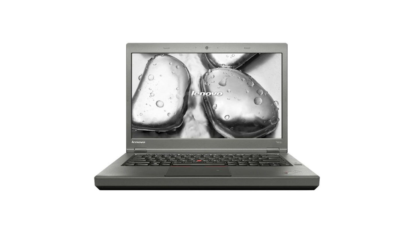 Laptop displaying an image of shoes on a white background