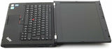 Laptop with open screen displaying keyboard on a white background